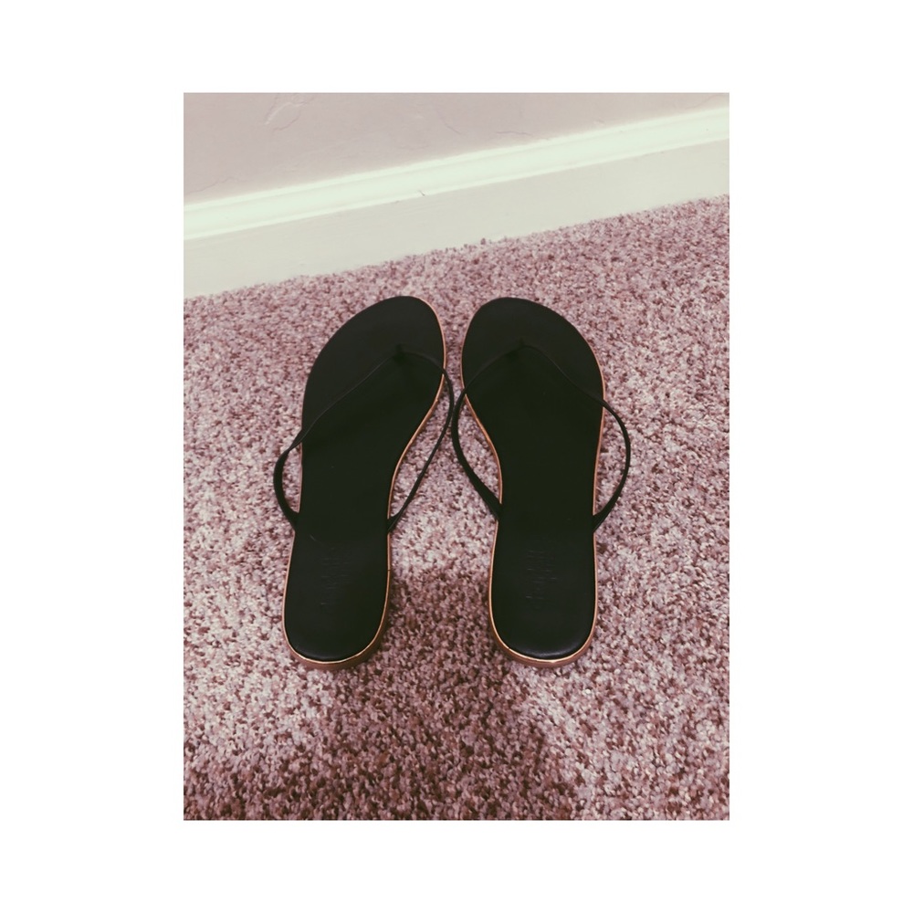 Black flip flop sandals